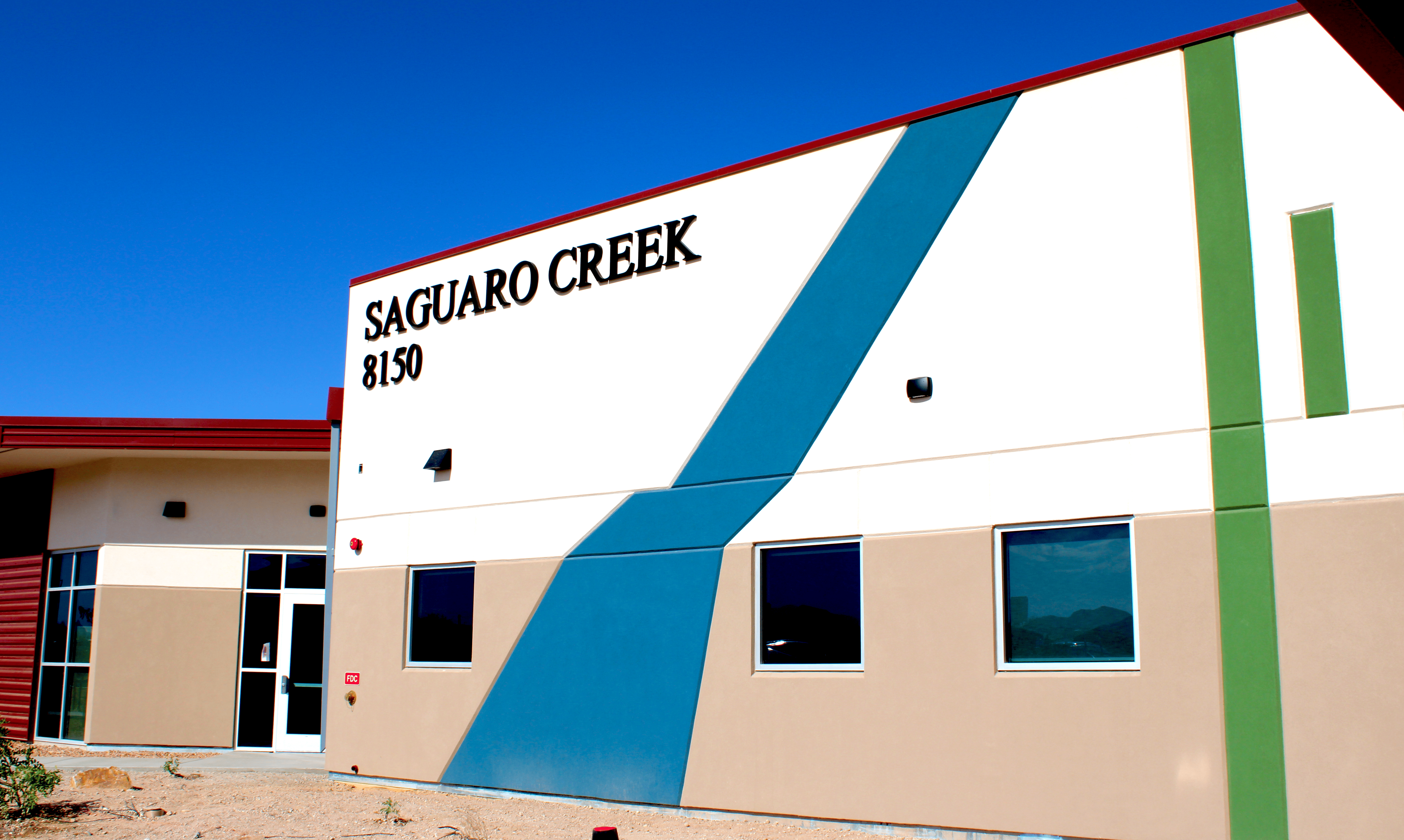 Large stucco firehouse building